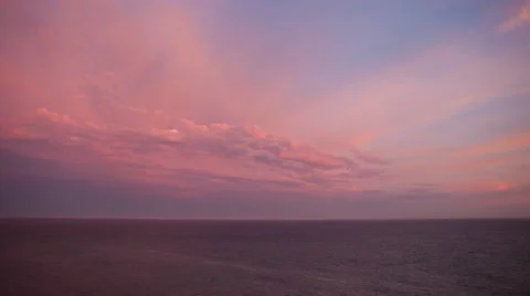 Time lapse of pink sunset clouds over the Pacific Ocean in Malibu California Stock Footage 57205973