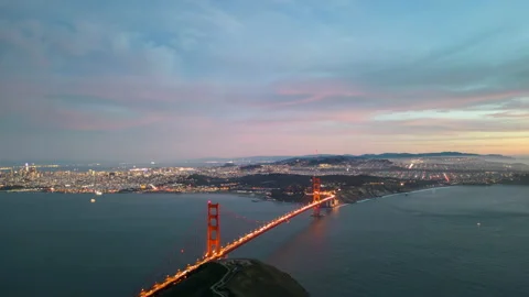 Time Lapse: Pink sunset sky over San Francisco cityscape as day becomes night Stock Footage 237305354