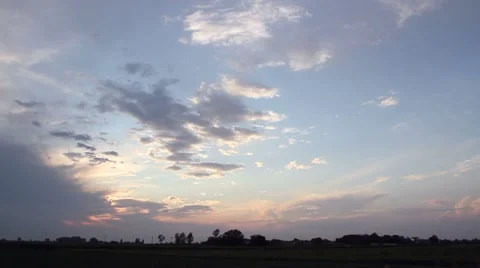 Time lapse on a pinkish sky at the sunset Stock Footage 47995094