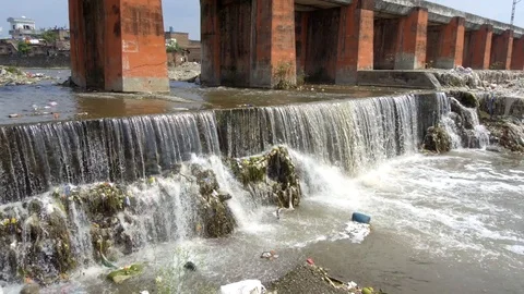 Time lapse of a polluted small river. Stock Footage 109614190