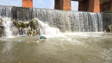 Time lapse of a polluted small river. Stock Footage 109614215