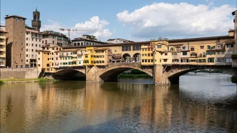 Time lapse of ponte vecchio in florence with blu sky and moving clouds Stock Footage 133434572