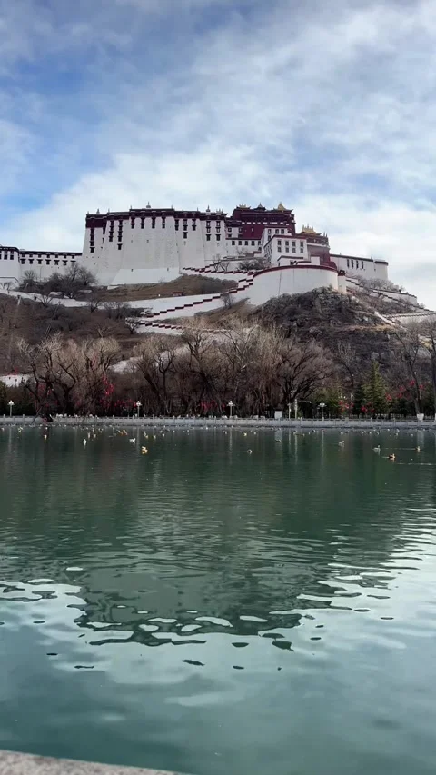 Time-lapse of Potala Palace Reflection in Lake with Moving Clouds Stock Footage 329351417