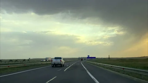 Time lapse. POV. Fast moving cars on the highway at sunset Stock-Footage 220294886