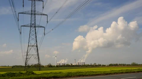 Time lapse power generating windmills and drax power station uk Stock Footage 49846588