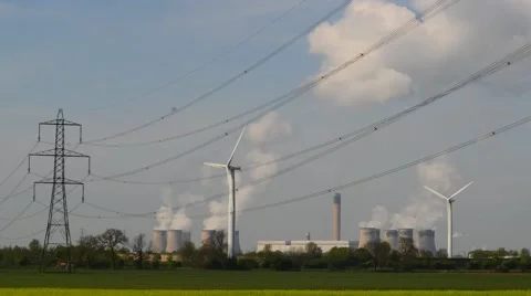 Time lapse power generating windmills and drax power station uk Stock Footage 49848937
