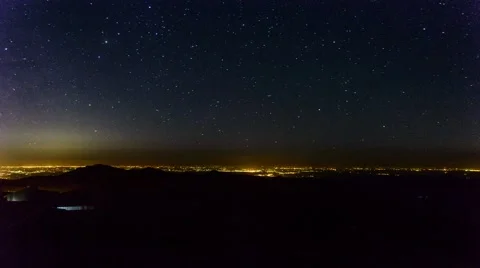 Time-lapse of Prahova valley cities at night with moon in the sky Video stock 51402574