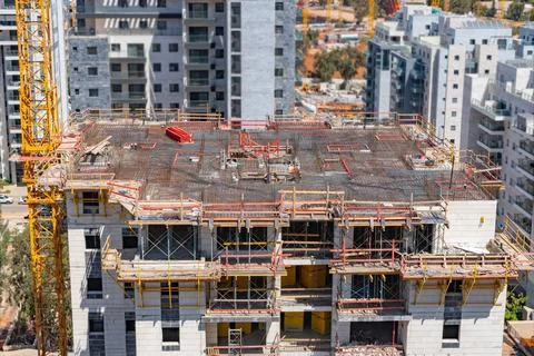 Time lapse of the process of constructing a multi-storey building, pouring Stock Photos