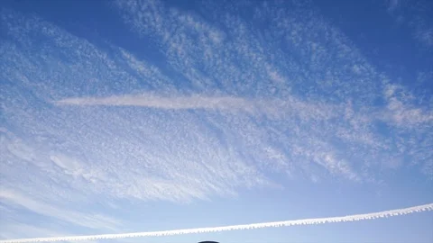 Time lapse of puffy clouds on blue sky.  Stock Footage 124161088