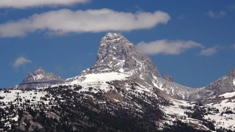 Time lapse of puffy white clouds on a beautiful sunny day floating past the s Stock Footage 198803977