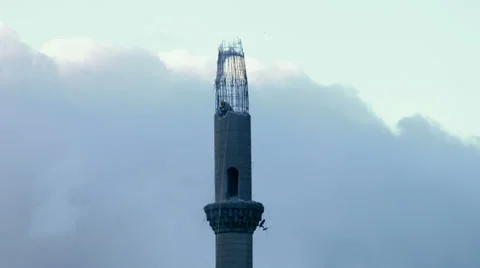 Time lapse pulling down the mosque (minaret) Stock Footage 34347214