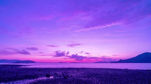 Time lapse of purple sunrise landscape A... | Stock Video | Pond5