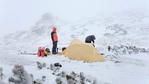 Time lapse of put up tent in winter mountains Stock Footage 73264291