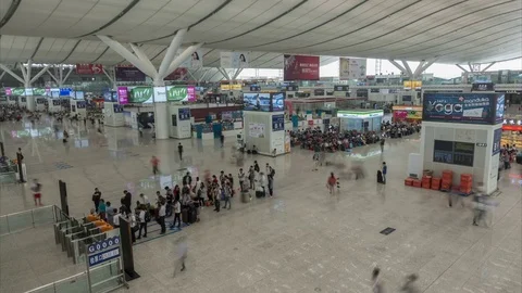 Time lapse of queue developing in busy Shenzhen railway station China Stock Footage 71528466