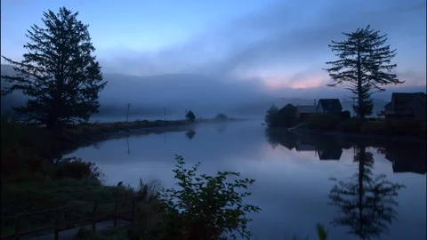 Time lapse - A quiet river at dawn Stock Footage 91152406