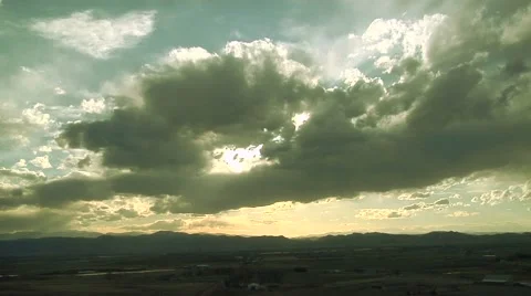 Time Lapse of Ragged Clouds Rocky Mountain Sunset Stock Footage 54742635