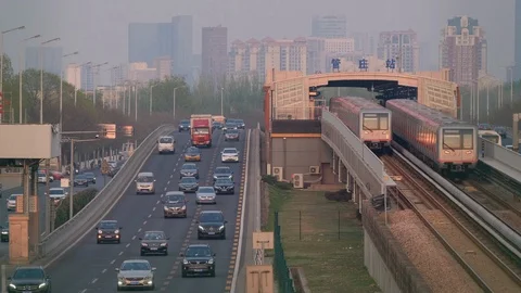 Time lapse of Rail transit line and cars in Traffic Jam in Beijing Stock Footage 128408297
