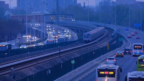 Time lapse of Rail transit line and cars in Traffic Jam in Beijing Stock Footage 128411668
