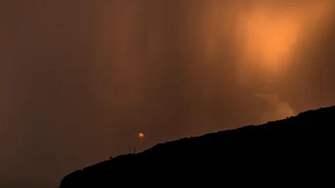 Time lapse rain and sunset on the background of the mountains. 4k, 3840x2160. Video stock 98934923