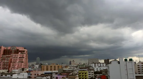 Time Lapse of Rain cloud formation in the sky above the city Bangkok 库存影片 64569207