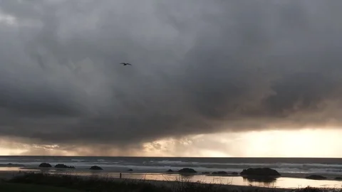 Time Lapse Of Rain Cloud Passing Epic Ocean Sunset Video stock 82800391