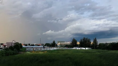 Time Lapse Rain Clouds moving at sunset, fade into night sky. Stock Footage 92284071