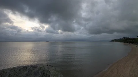 Time lapse of rain clouds over Cacupé Beach Stock Footage 90681975