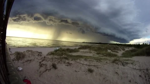 Time Lapse Rain Clouds Rolling In Over Beach Stock Footage 96879597