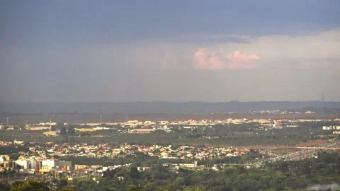 Time Lapse - Rain is coming over the city - Zoom IN Stock Footage 134349938