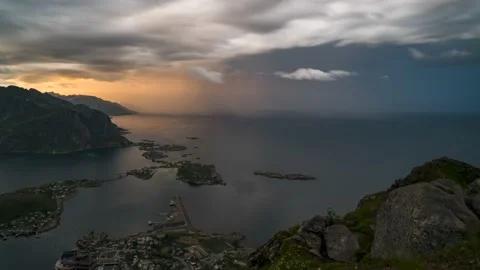 Time lapse of rain over the ocean and moving towards Lofoten islands Video stock 233782316