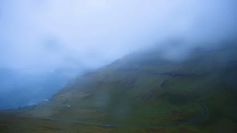 Time-lapse of rain, overcast clouds moving over mountain Stock Footage 116598401