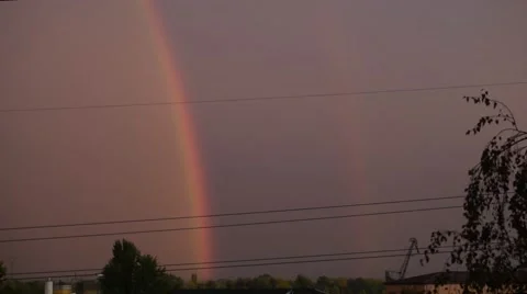 Time lapse of rainbow in a city Stock Footage 69071737