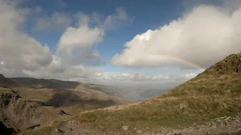 Time lapse of rainbow looking down towards Haweswater Reservoir Stock Footage 163274076