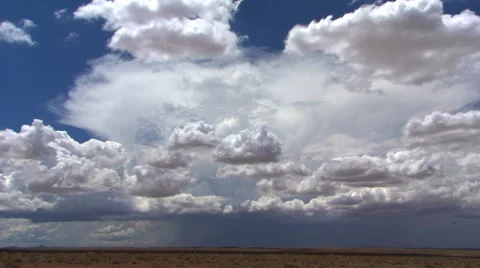 Time-lapse rainstorm and gathering clouds advancing over prairie Stock Footage 59533382