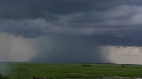 Time Lapse: rainstorm is pouring down on the grasslands Stock Footage 40743599