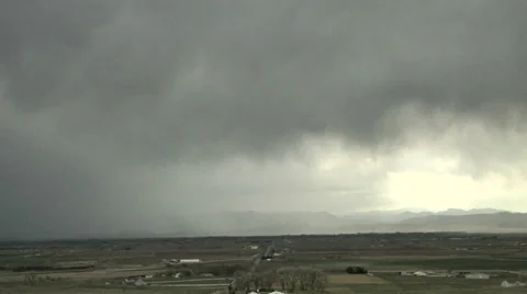 Time Lapse of Rainstorm Sweeping onto the Front Range of the Rockies Stock Footage 54746311