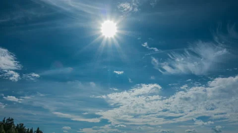 Time lapse. Rapid movement of clouds in the summer over wheat fields Stock Footage 93449292