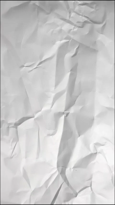 Time-lapse of rapidly changing texture of a white crumpled paper..Vertical Stock Footage 282003605