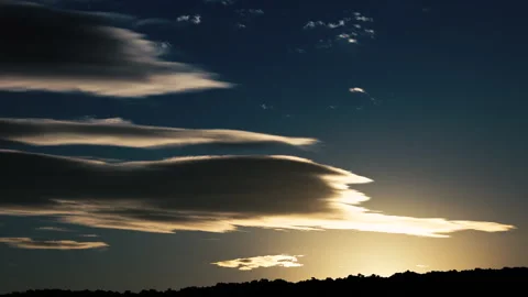 Time-Lapse of Rare Lenticular Clouds with Bright Sunlight and Deep Blue Stock Footage 318950169