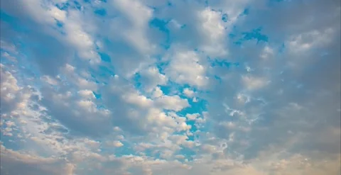 Time lapse real shot of changing cloud formations in the blue sky Stock Footage 281169938