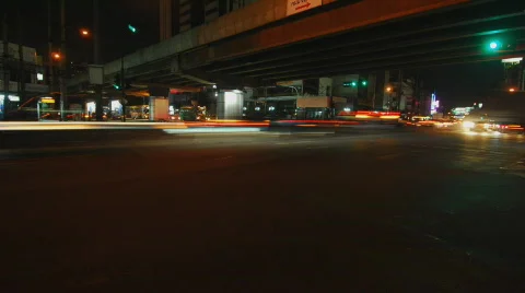Time lapse recording of traffic under a bridge Stock Footage