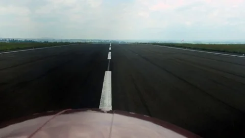 Time-lapse of red airplane moving over the green landscape Stock Footage 81230372