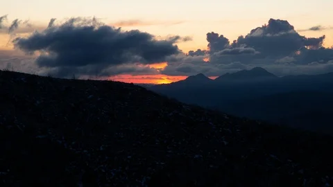 Time lapse of the red and orange glow of the sunset in the San Gabriel Mountains Stock Footage 126655285