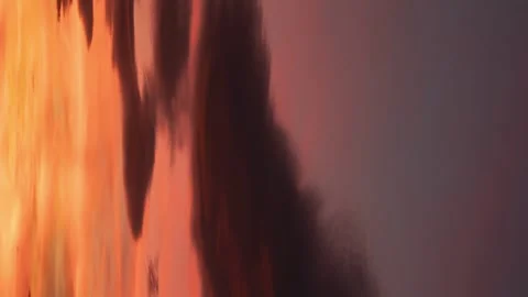 Time lapse of a red sky with moving clouds at sunset until night appears Stock Footage 256928412