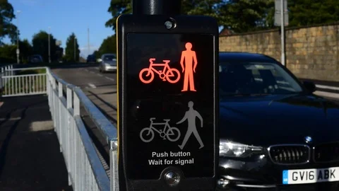 Time lapse red stop and green go warning symbols for pedestrians and cyclists UK Stock Footage 78632663