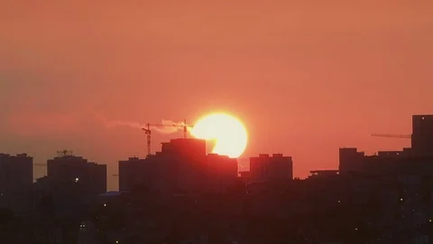 Time lapse red sunset over city, close up Stock Footage 78118421