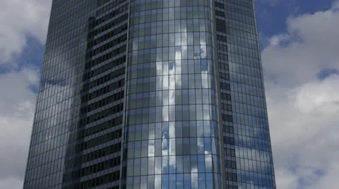 Time lapse reflection clouds in glass building Stock Footage 49672462