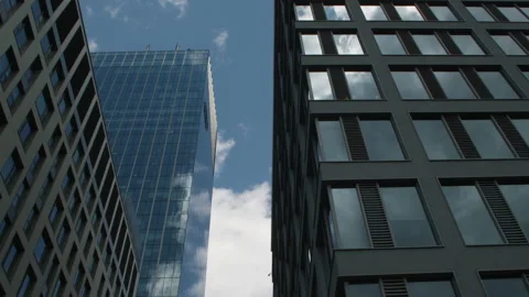 Time lapse. Reflection of clouds on a glass building Skyscraper.. Stock Footage 229023276