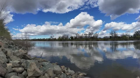 Time lapse with reflection on the sacramento river Stock Footage 284982076
