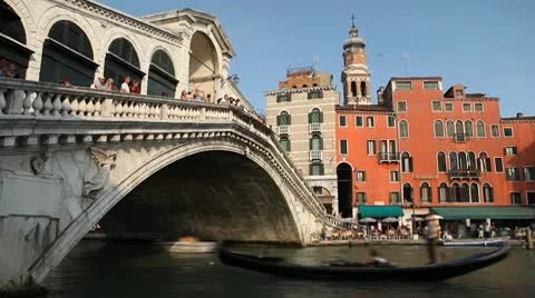 Time Lapse of Rialto Bridge in Venice, Italy, people boats and gondolas trip Stock Footage